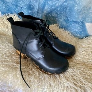 Black leather clog boots